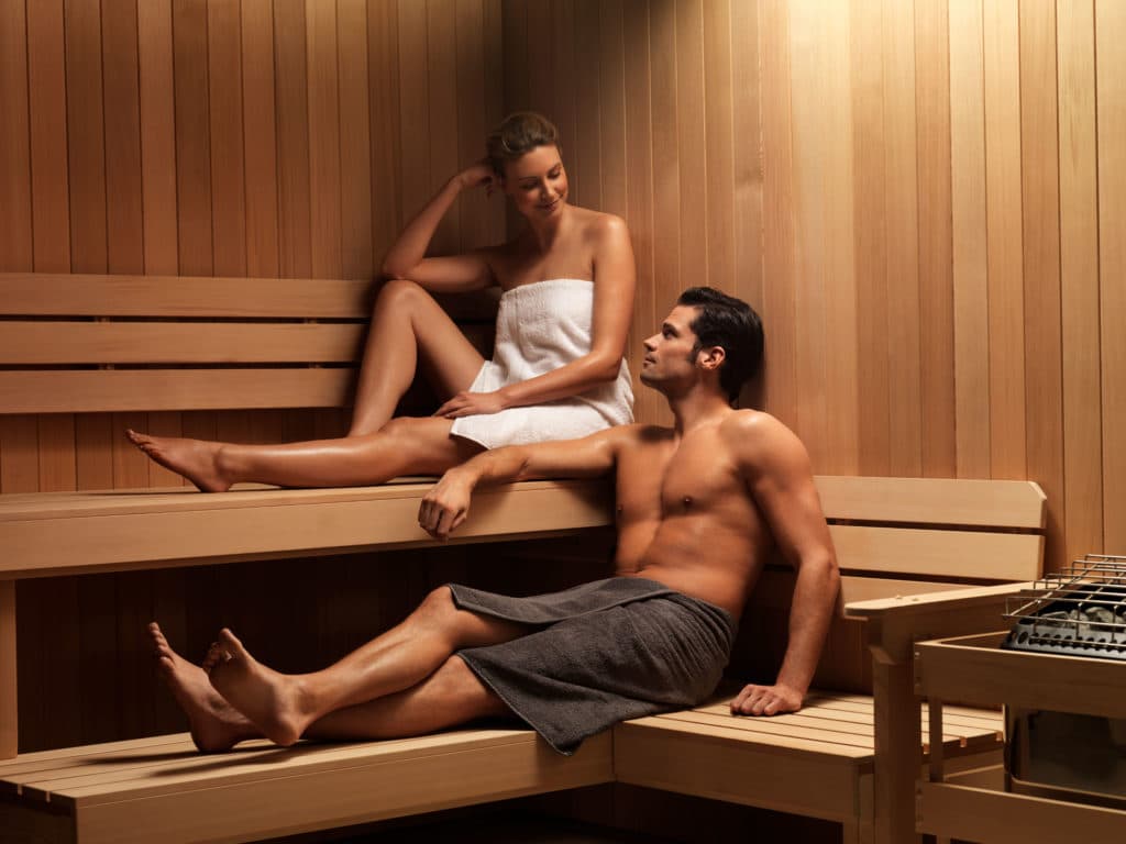 Amerec-Sauna---Man-&-Woman-on-bench